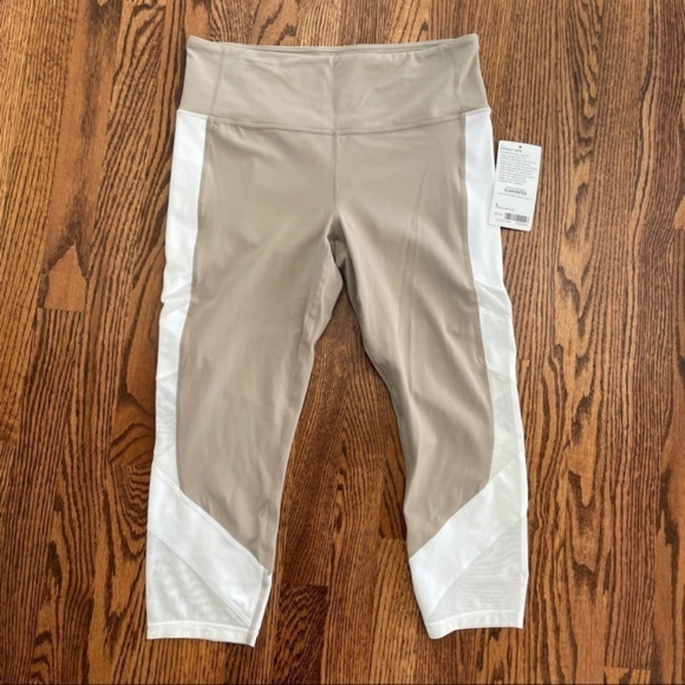 Athleta exhale tan white cropped Capri leggings mesh detail size L NWT